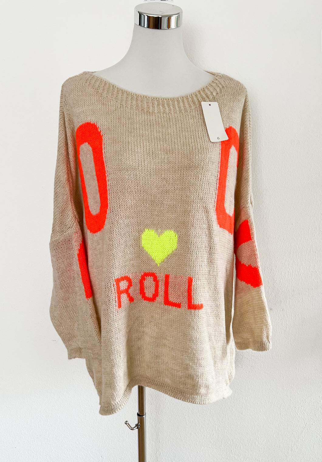 KNITTED SWEATER WITH ROCK LETTERING